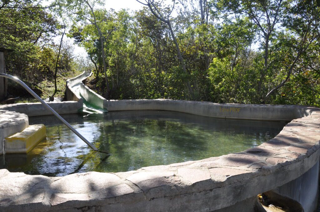 image of a hot spring and aqueduct, las hornillas volcanic activity centre, miravalles volcano, costa rica 