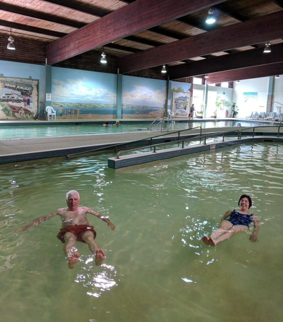 image of bob and jean in a pool, Manitou Springs Resort & Mineral Spa, manitou beach, saskatchewan