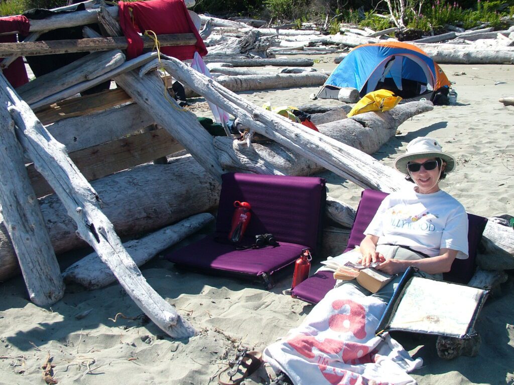 image of jean relaxing on medallion beach, vargas island, british columbia