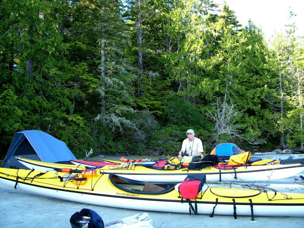 image of bob with kayaks, vargas island, british columbia