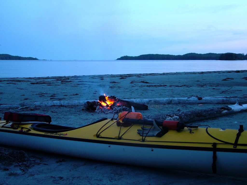image of kayak and bonfire, vargas island, british columbia