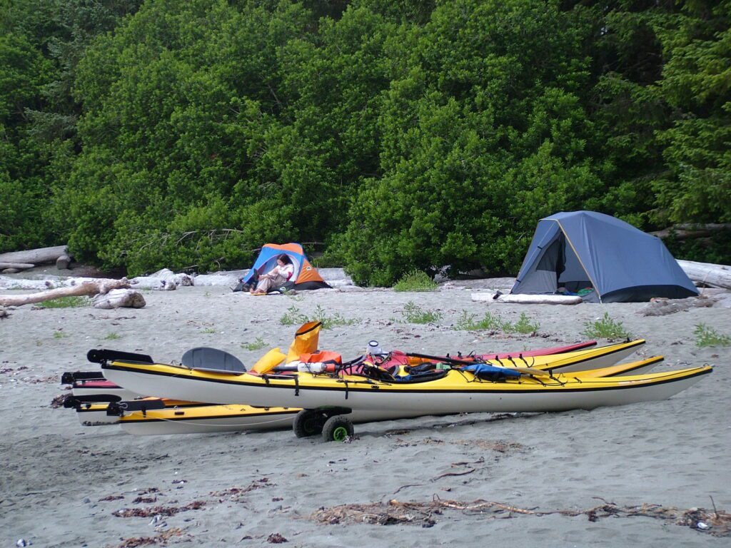 image of tents and kayaks, ahous bay, vargas island, british columbia