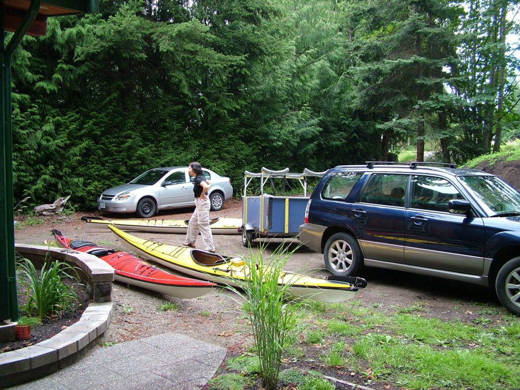 image of jean with kayaks, deep bay, vancouver island, british columbia