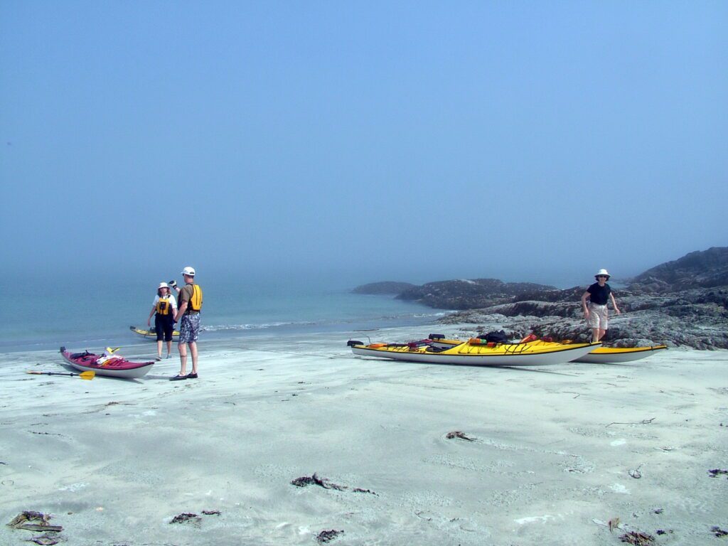 image of people and kayaks, vargas island, british columbia
