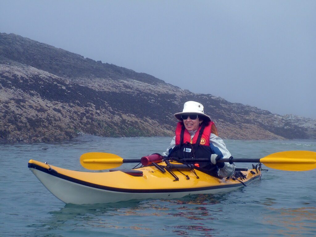 image of jean in her kayak, vargas island, british columbia
