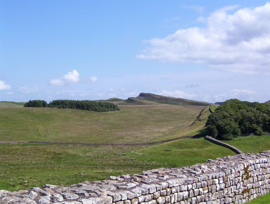 image of Hadrian's Wall heading towards Sewingshields Milecastle 35, Hotbank Crags, England