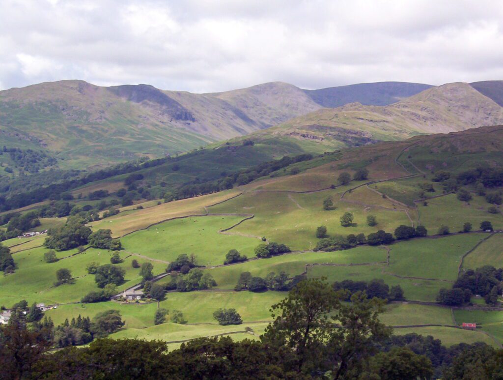image of fells and farmland, wansfell pike, lake district national park, ambleside, England