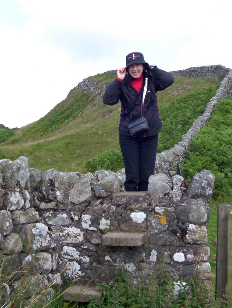 image of Jean using a stile, Hadrian's Wall near Housesteads, England