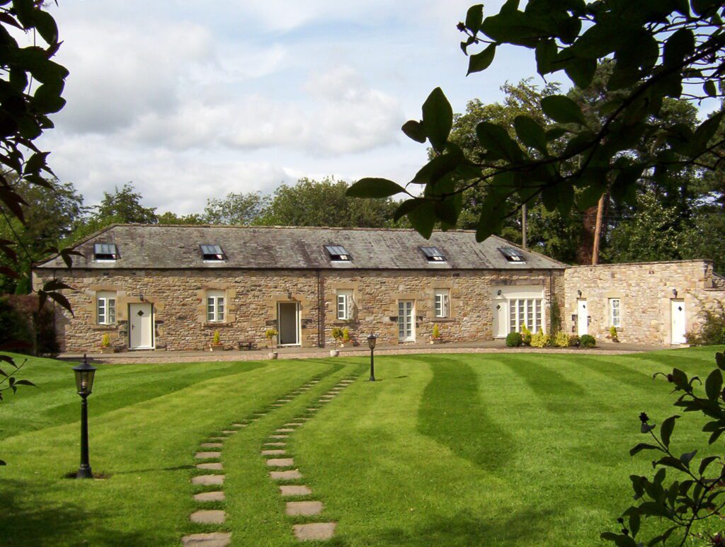 image of Langley Castle stables, England
