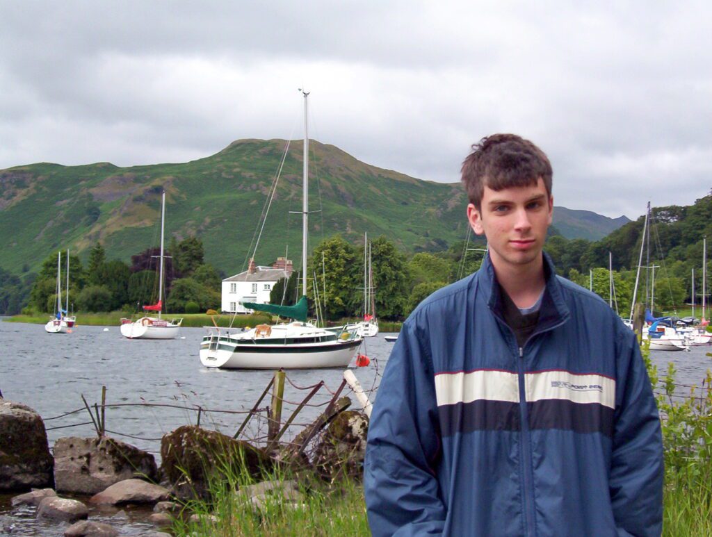 image of a person at the shore of ullswater lake, cumbria, England