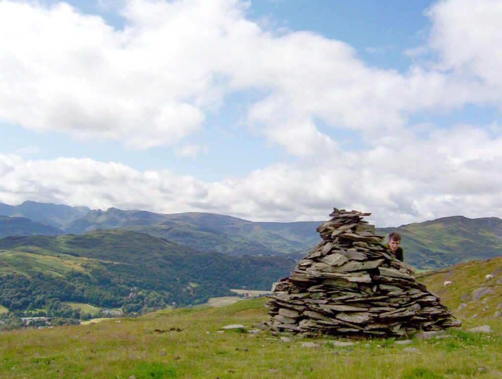 image of the cairn at the summit of wansfell pike, lake district national park, ambleside, England