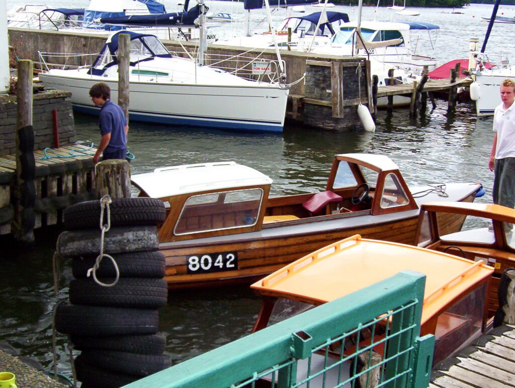 image of a tuckerboot, wooden boat for hire, Bowness Bay, Bowness-on-Windermere, Lake Windermere, Lake District National Park, England